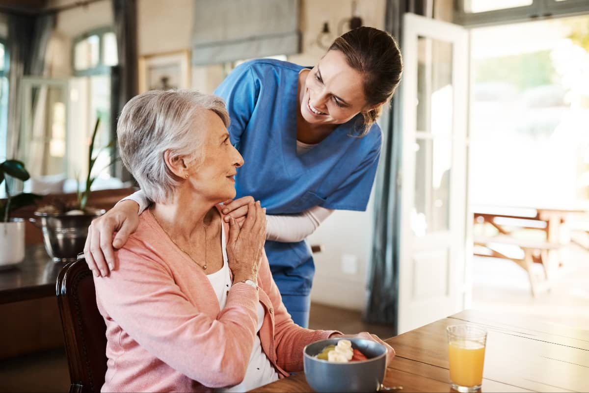 A caregiver with a senior woman