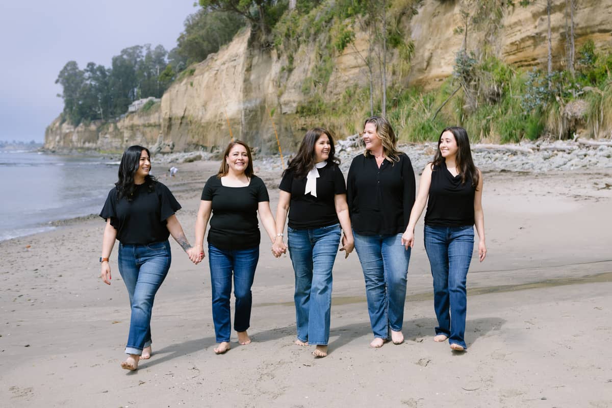 Pacific Angels Home Care team walking on the beach