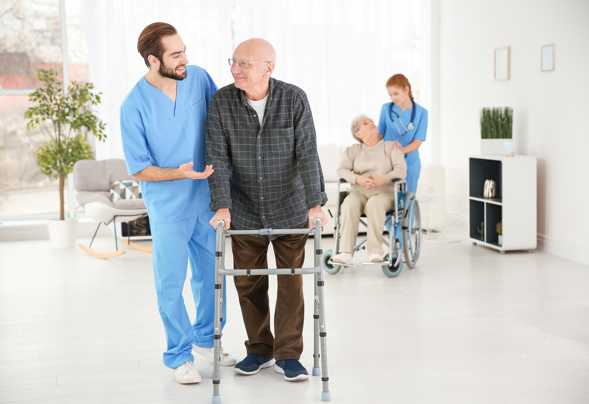 Two caregivers with seniors